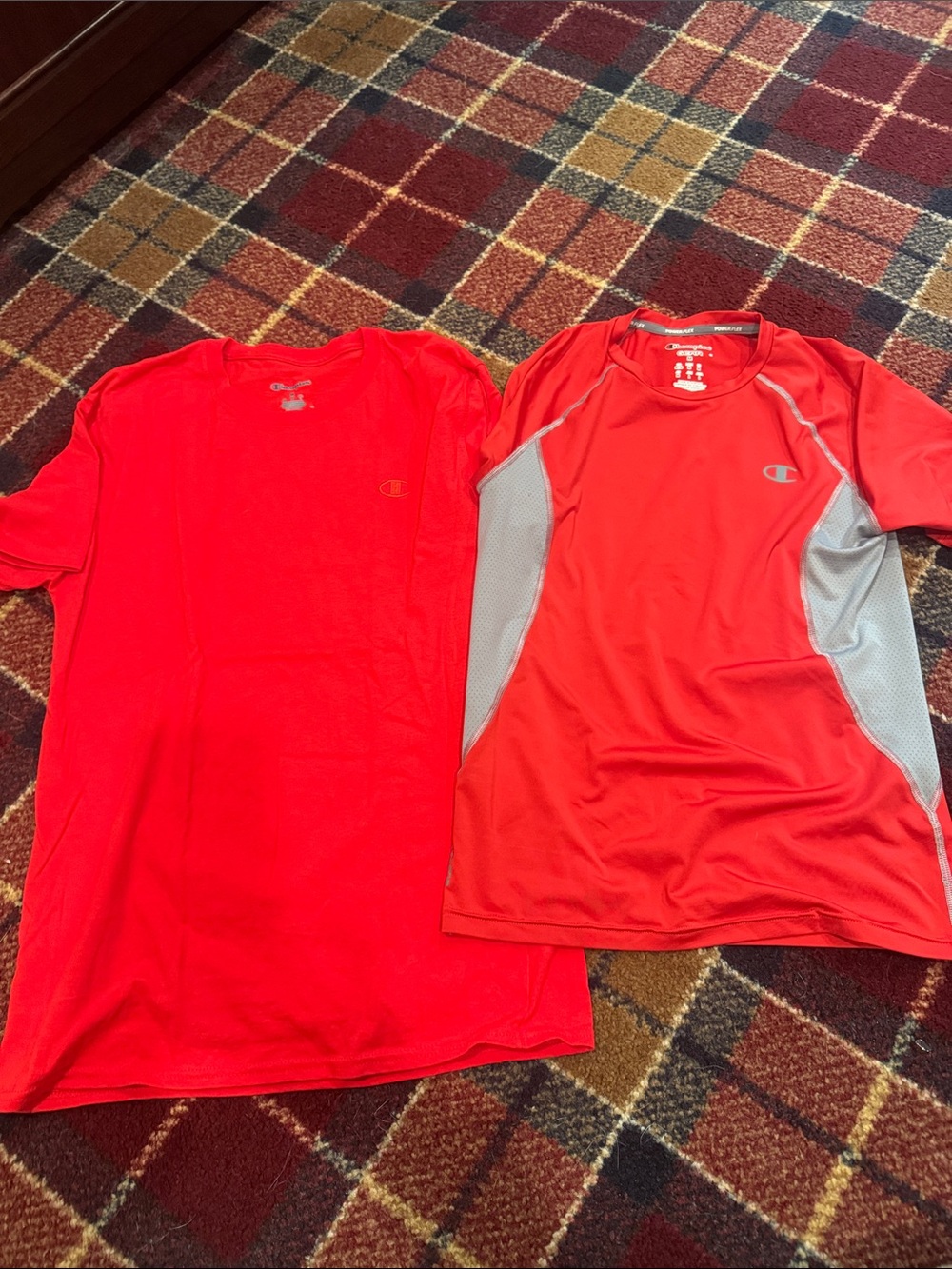 2 men’s size M Champion red  Short Sleeve Athletic shirts.